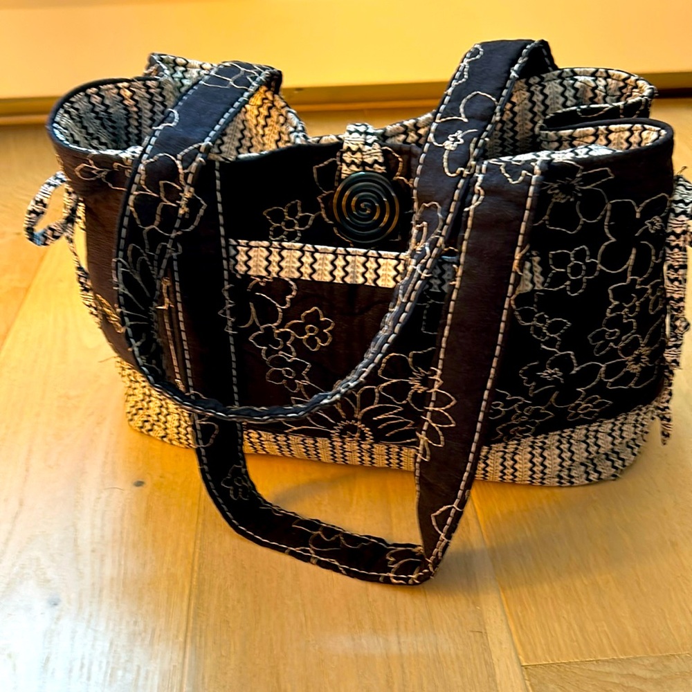 Handcrafted black and white satchel bag